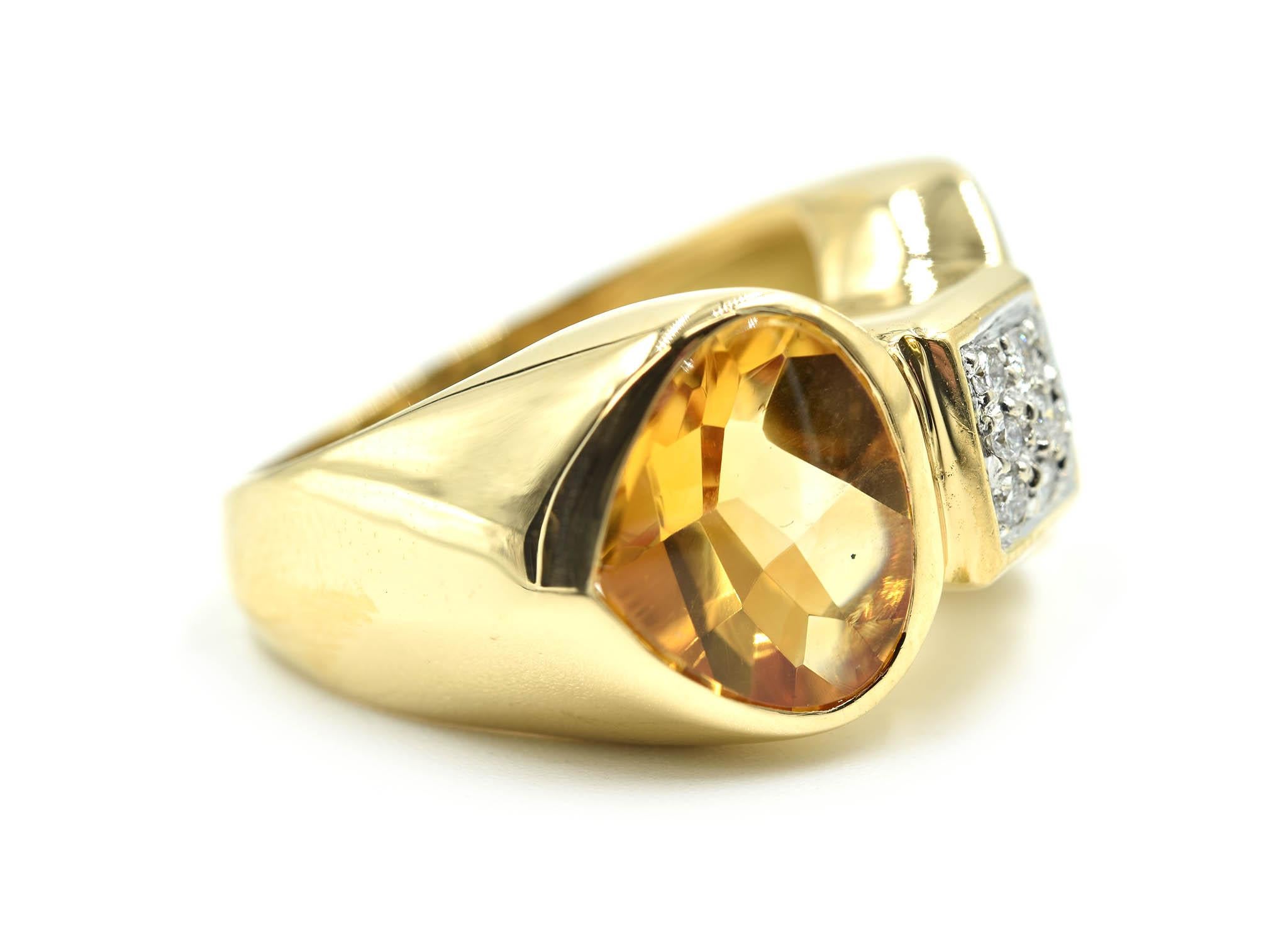 This is an 18k yellow gold fashion ring set with fancy cut citrine gemstones and round diamonds in the center. Each citrine is smooth on the surface, but faceted on the pavilion. The diamonds amount to 9 stones, weighing 0.15 carats. Each diamond is