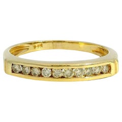 Bague à 10 pierres en or jaune 14k 0.15ctw Round Brilliant 10 Stone Channel Set