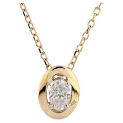 Collar con colgante de oro amarillo de 14 quilates y un diamante de corte ovalado de 0,16 quilates