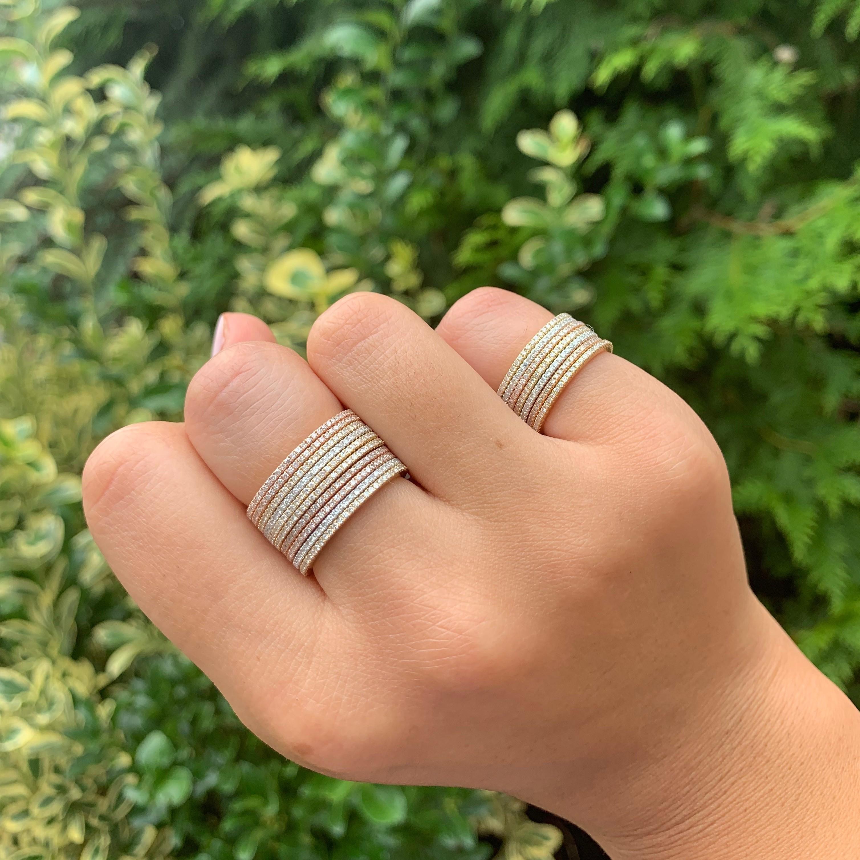 This ring is a must-have for every woman's jewelry wardrobe. It is a delicate beautiful and sparkly diamond stackable eternity band. This simple, elegant piece features a 14-karat gold construction with 18 points of round-cut sparkling white