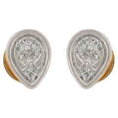 Pendientes de oro amarillo de 14 quilates con diamante natural de 0,18 quilates y solitario en forma de pera en dos tonos