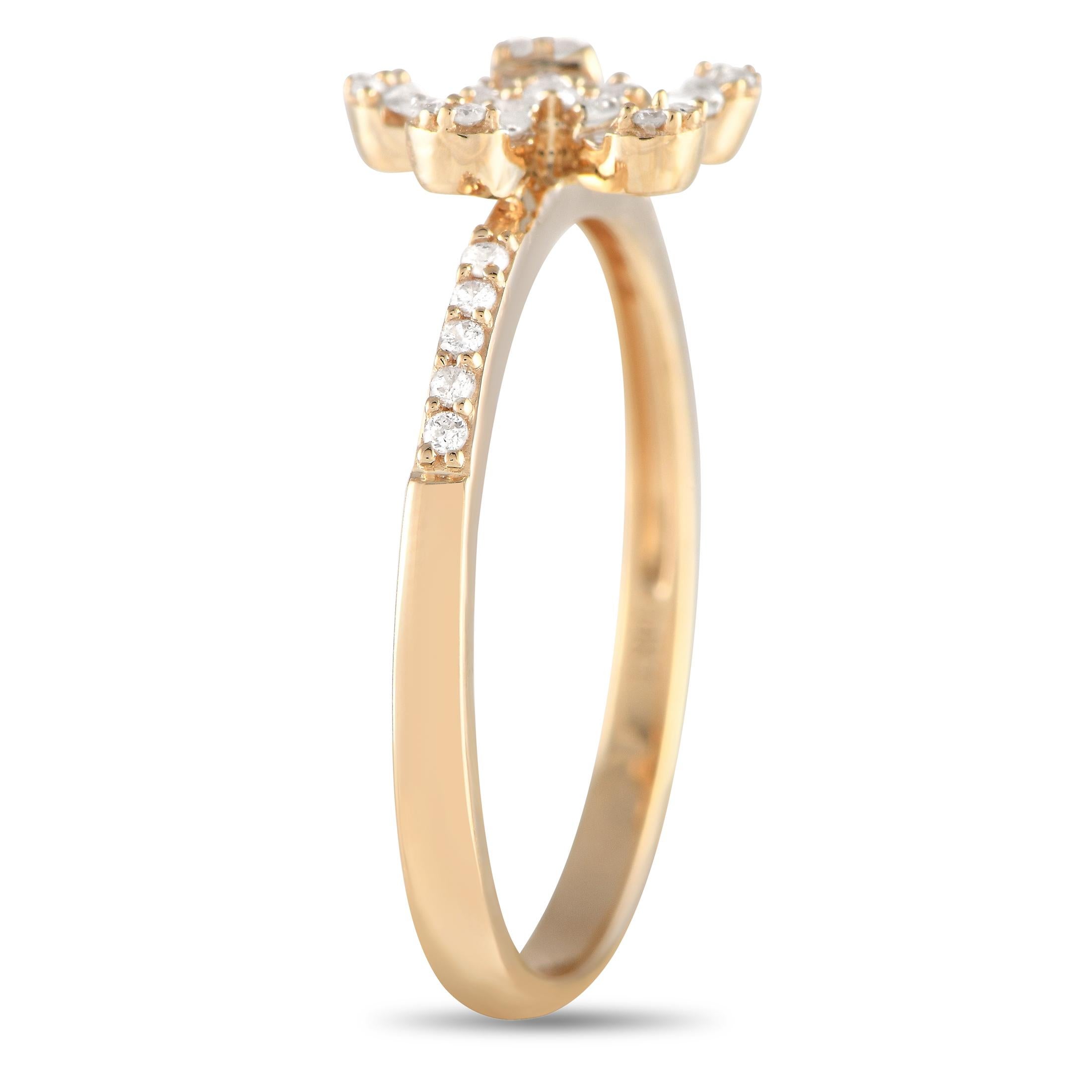 You'll love the elegant look and the laidback feel of this diamond ring. It is designed with a thin shank with petite round diamonds tracing the shoulders. The focal point is a flower motif with five pear-shaped petals embellished with a lovely