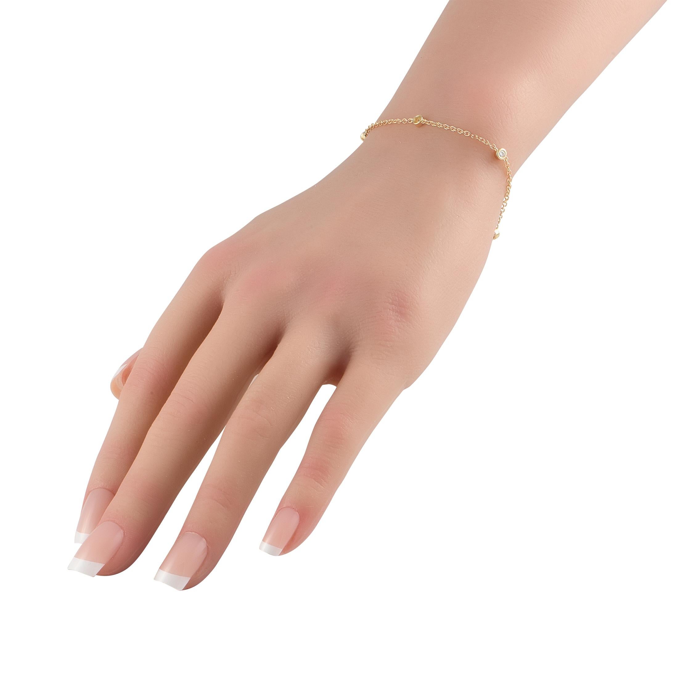 This 14K Yellow Gold bracelet will effortlessly complement any ensemble. The understated design comes to life thanks to a series of bezel-set Diamonds totaling 0.22 carats. Sleek and elegant, it measures 7.0 long and comes complete with lobster