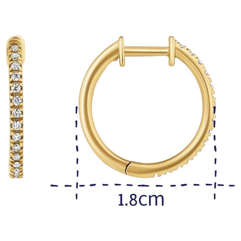 14K yellow Gold 0.24 Carat Midi Pave Diamond Hoop Earrings by Shlomit Rogel

When in doubt, put on a pair of sparkly diamond hoop earrings. A timeless beauty, these midi hoops are handcrafted from 14k yellow gold and pavé set with 30 genuine