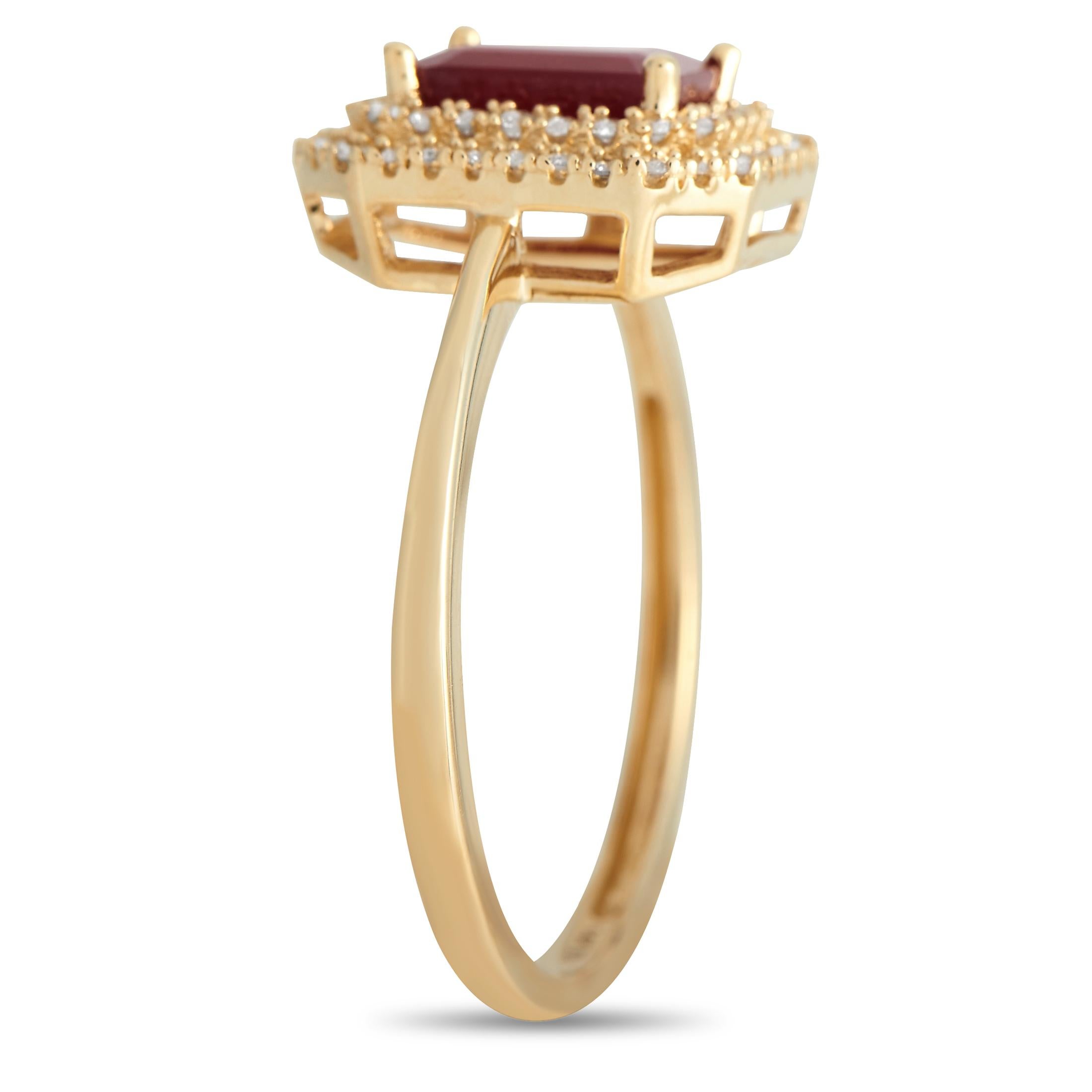 Let this statement ring have its moment and watch it elevate any beige, white, or black outfit. This ring features a slender band in 14K yellow gold, topped with a step-cut ruby framed by two emerald-shaped halos of round diamonds. Evoking the