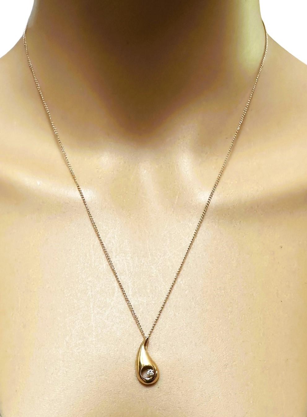 Brilliant Cut 14k Yellow Gold ..025 cwt Diamond Tear Drop Pendant and 14k Gold Chain 18.5