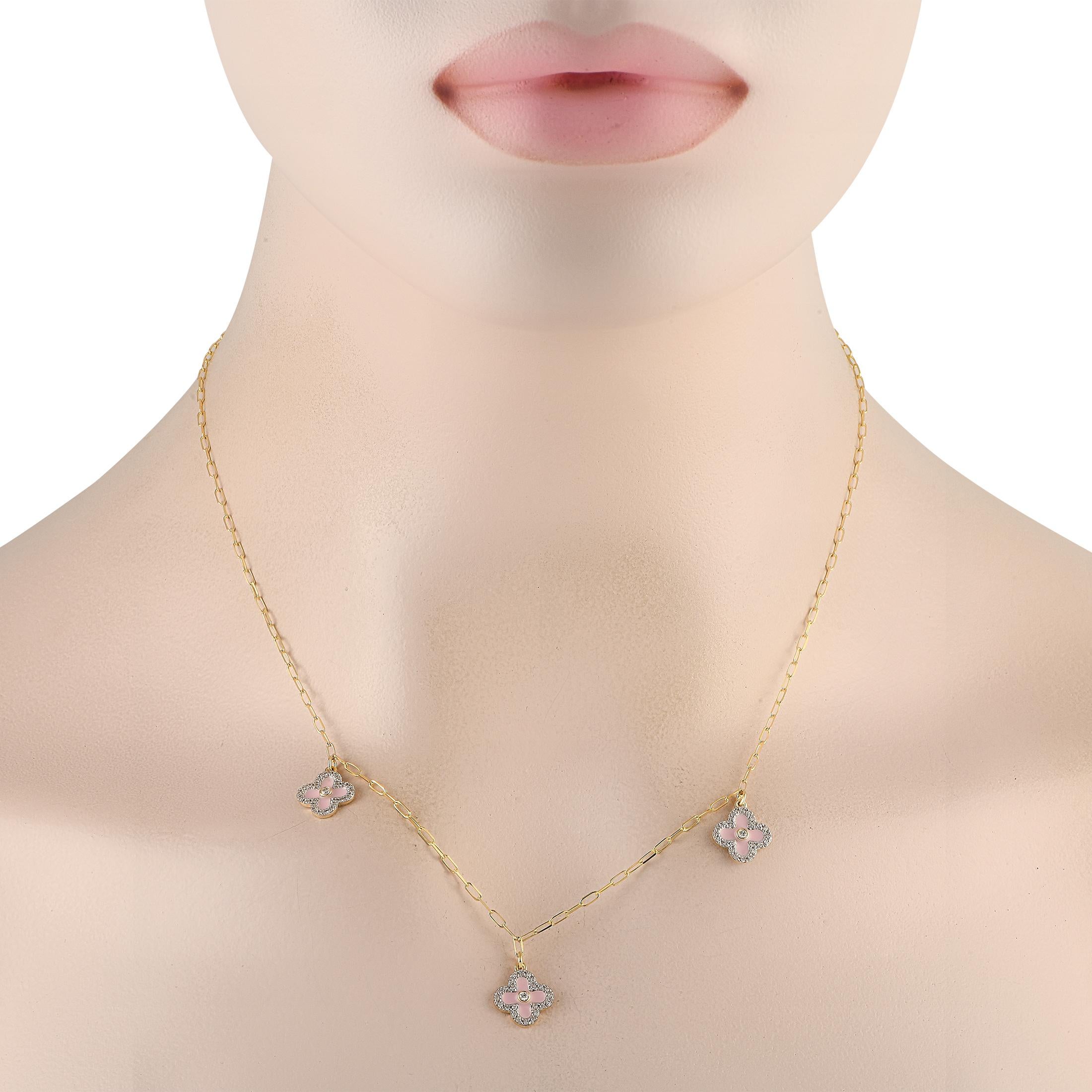 Add a touch of charm and sophistication to any ensemble with this exquisite 14K Yellow Gold necklace. Suspended from this pieces chic paperclip chain, youll find a trio of pink clover-shaped pendants measuring 0.45 round. Together, they beautifully