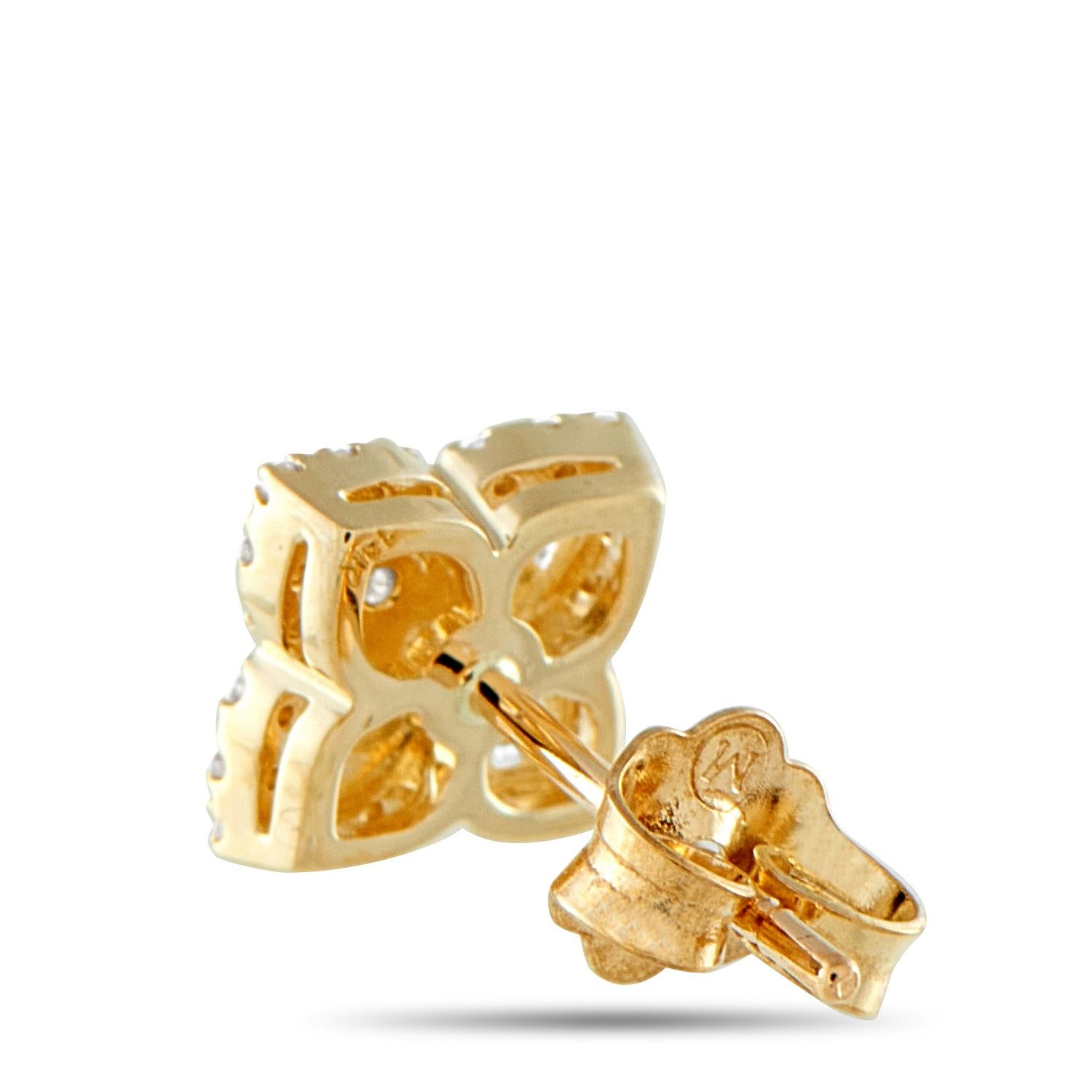 Compact yet detailed, these stud earrings capture attention without overwhelming. The center features five round diamonds arranged in a quatrefoil, while a fine diamond halo traces the four-lobed shape, giving the earrings a defined, dimensional