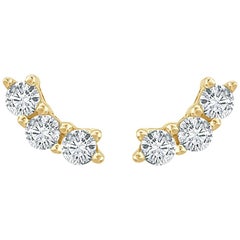 Pendientes de oro amarillo de 14 quilates con 3 diamantes de 0,30 quilates