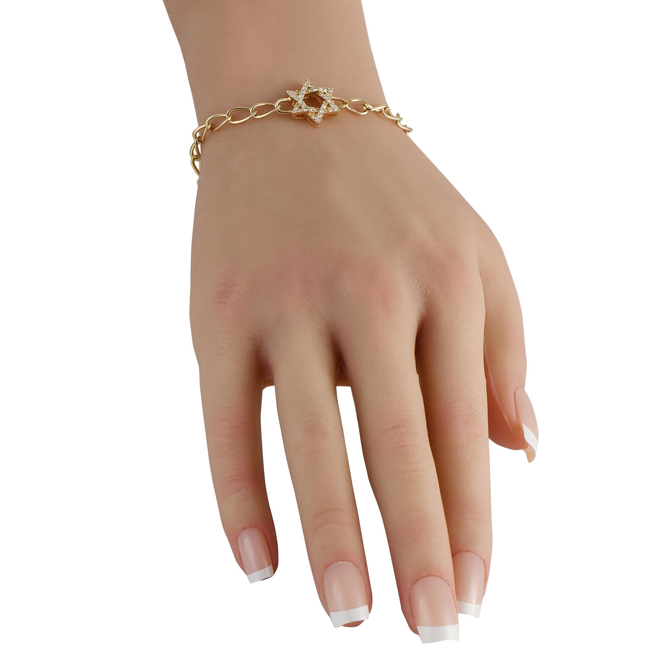 Crafted in 14K yellow gold with twisted oval links, this sleek bracelet serves as a striking emblem of harmony and balance. At its center is a six-pointed stara hexagrampaved with brilliant diamonds. Expressive and elegant, the hexagram invites