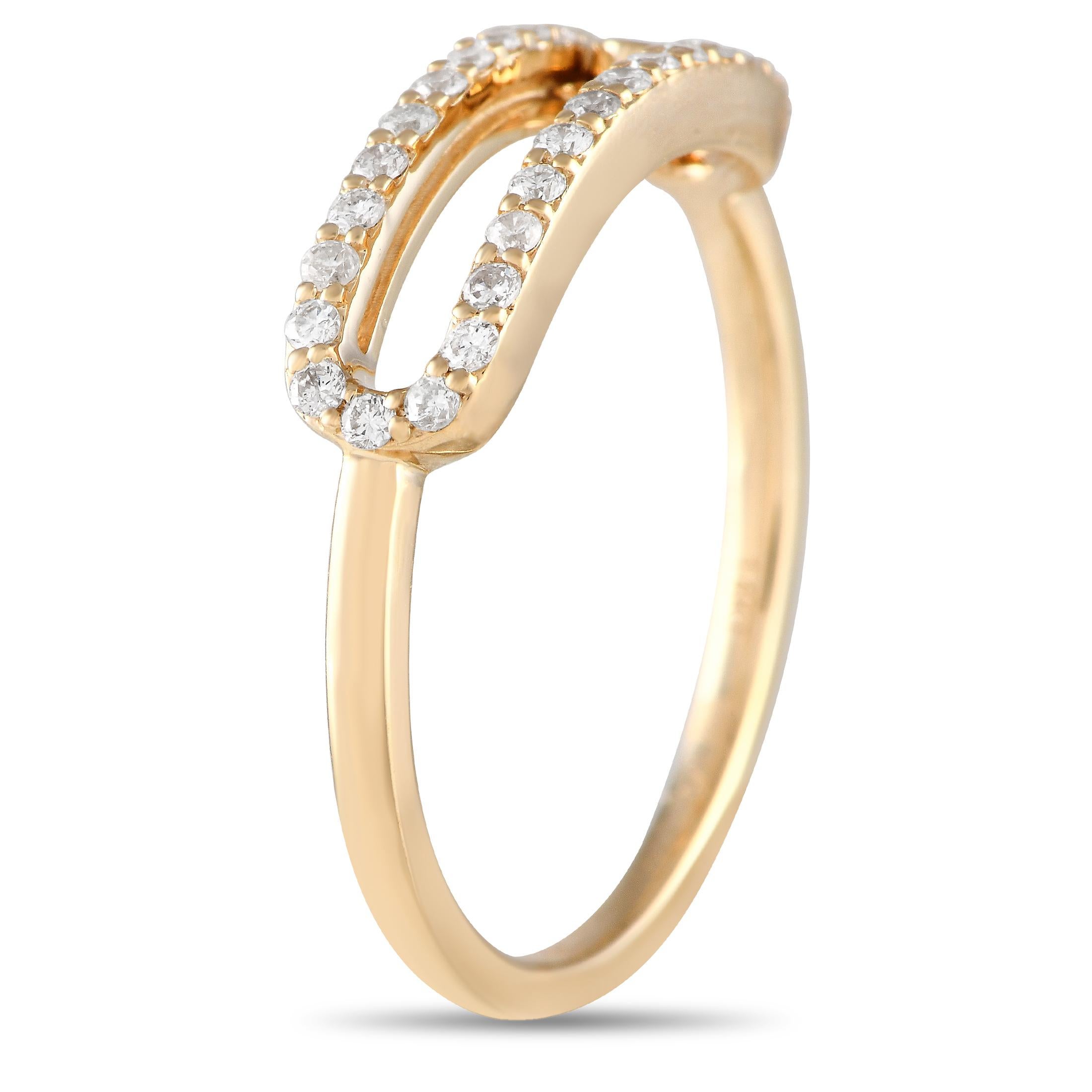 Designed with a diamond in motion, this ring will soon become a mainstay in your daily rotation. The ring has a slim shank in 14K yellow gold, adorned with an open channel where a single bezel-set diamond slides back and forth. The elongated oval