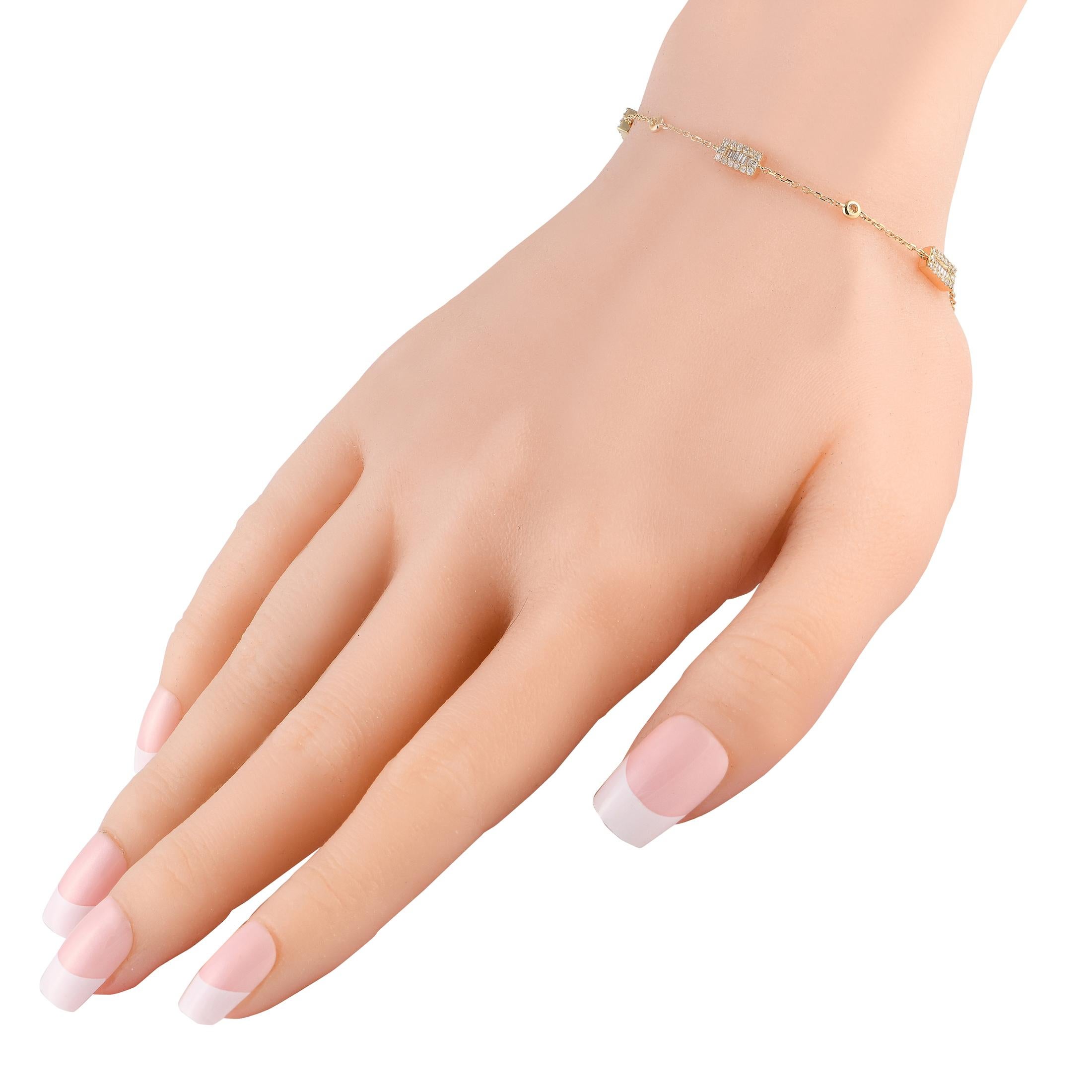 This bracelet is a simple stunner that looks good on its own or layered with other bracelets. It is crafted in 14K yellow gold and designed with an alternating pattern of bezel-set round diamonds and diamond clusters in a rectangular setting.This