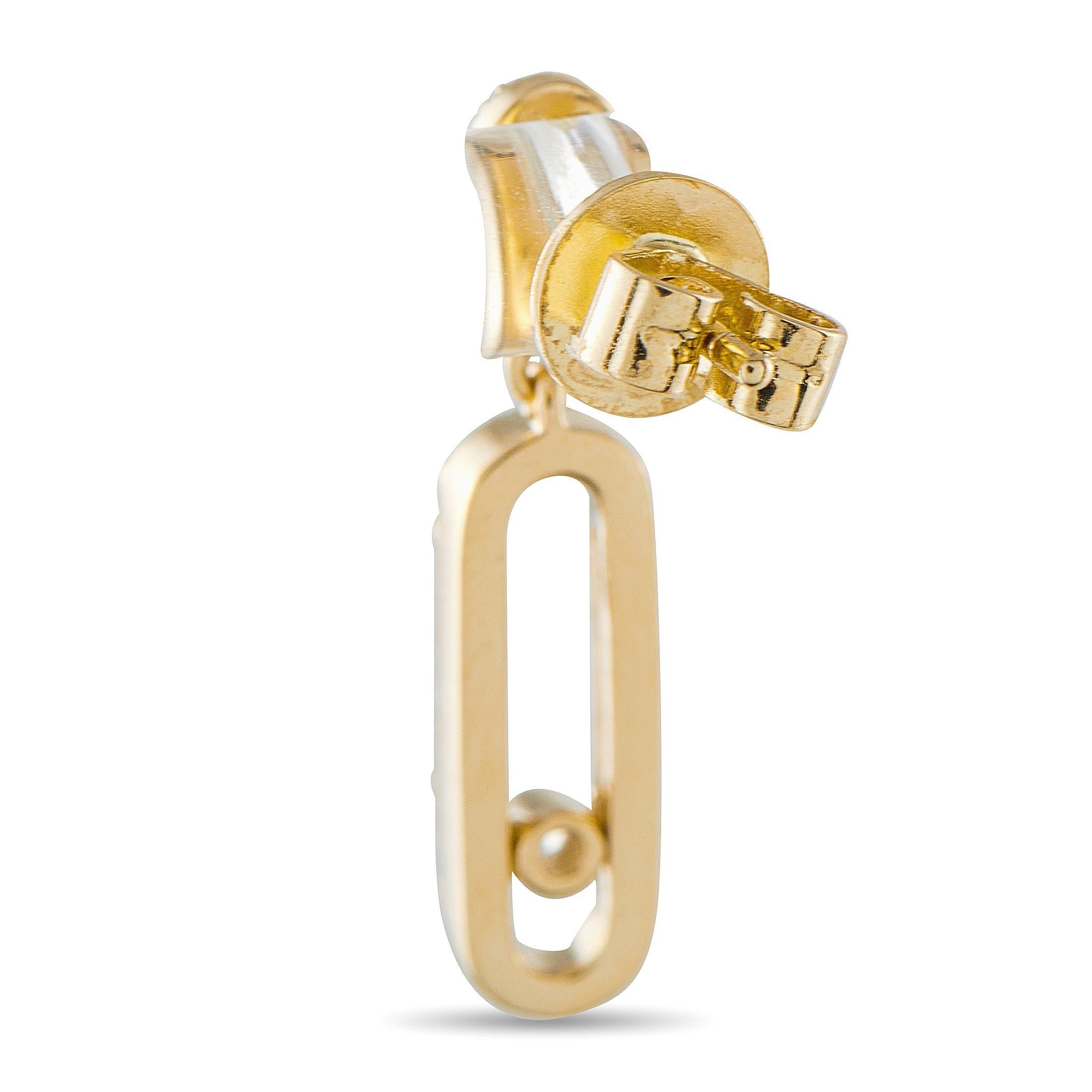 Questi orecchini sono un classico immediato. Un design elegante e sobrio li rende ideali per ogni minimalista, mentre i diamanti con un peso totale di 0,50 carati assicurano una dichiarazione sempre scintillante. Incastonati in oro giallo 14 carati,