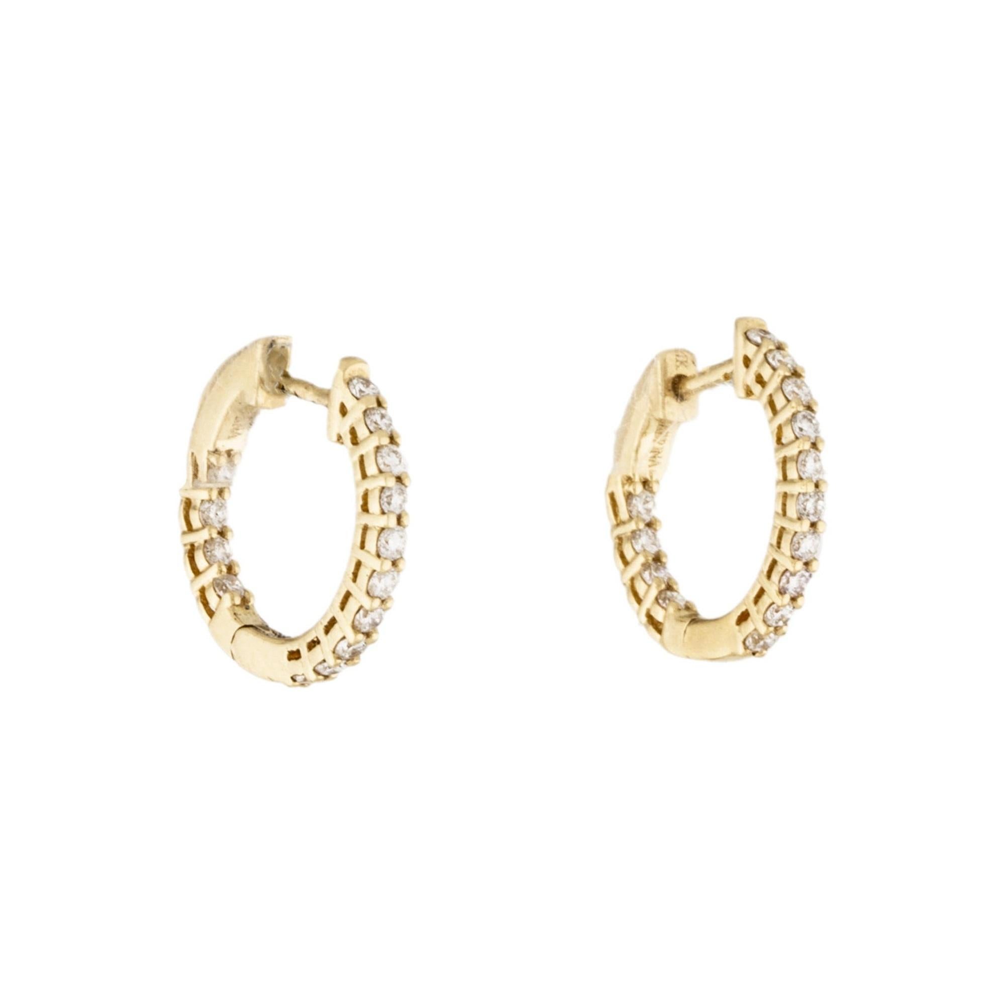 Quality Earrings Set: Made from real 14k gold and 28 glittering natural white approximately 0.50 ct. Certified diamonds, featuring a single line of prong set white diamonds 1/2