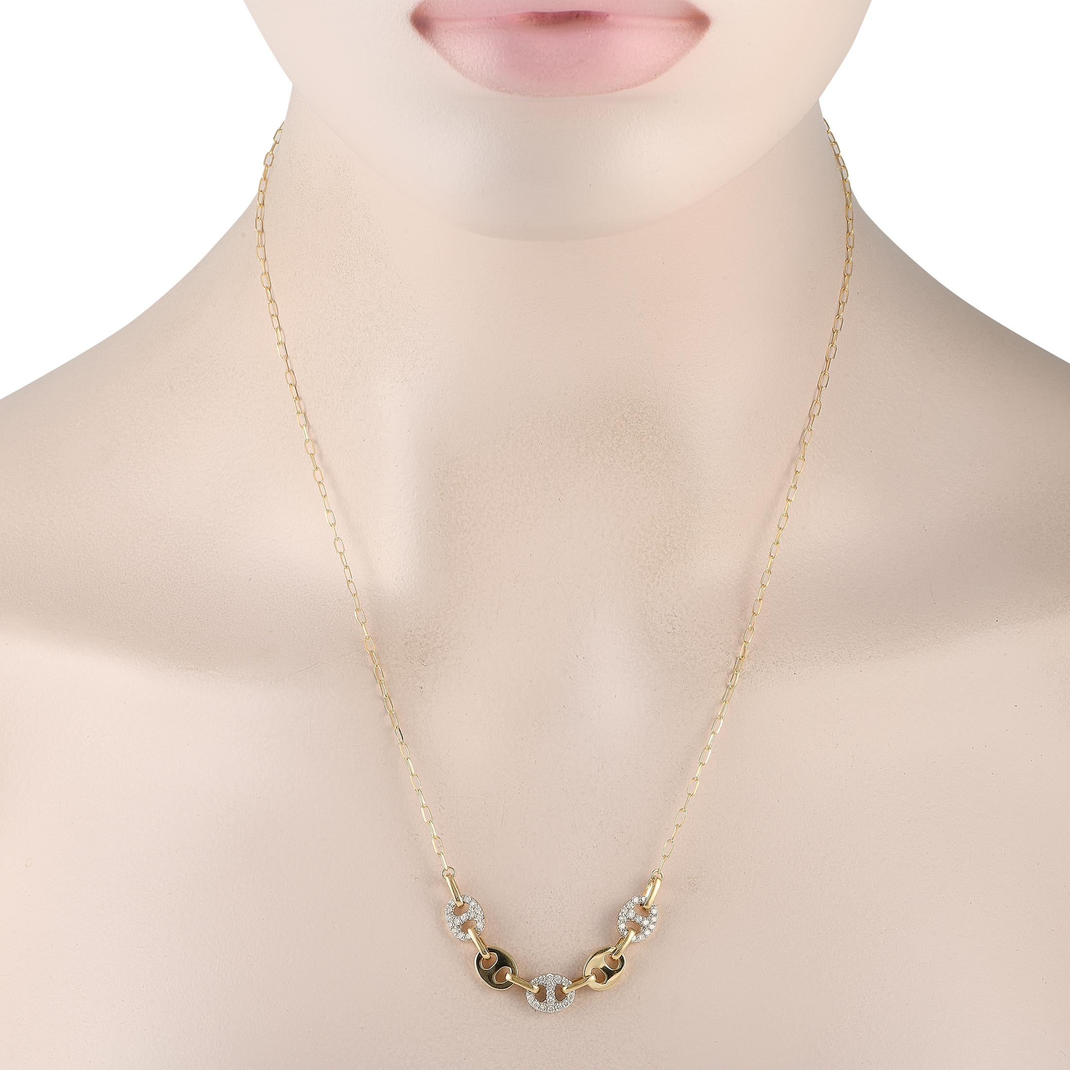 This understated necklace is ideal for everyday wear. Suspended at the center of a delicate 19.5 chain, youll find a series of interlocking 14K Yellow Gold circular motifs. Diamonds with a total weight of 0.50 carats add extra visual impact to this