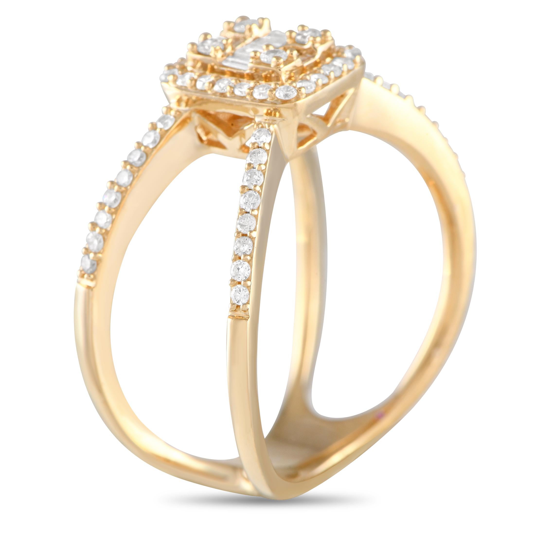 This stunner reflects the true essence of an empowered woman. With its confident stance and unabashedly attractive design, the ring is a force to be reckoned with. This piece in 14K yellow gold features two narrow shanks that cross over, forming a