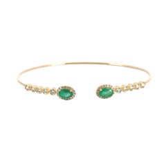 14k Yellow Gold 0.53ctw Round Brilliant Diamond and 0.88ctw Emerald Bangle
