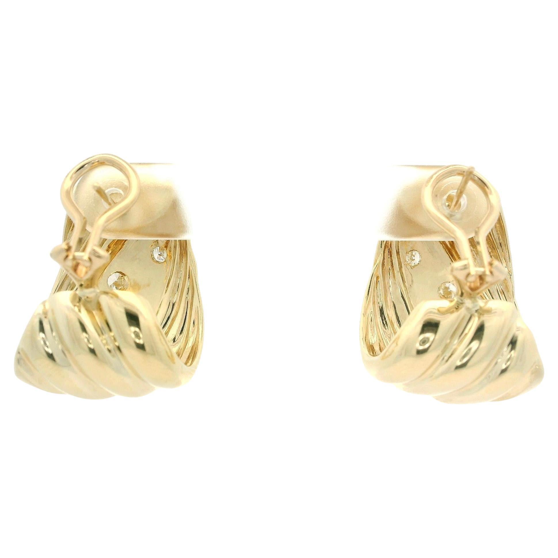 -Pierre(s)
(8) Diamants naturels authentiques - taille ronde et brillante - en serti brillant - belle couleur blanc brillant - 0,54ctw (approx.)

MATERIAL : Or jaune 14k massif
Poids : 20,69 grammes
Dos : Dos de poteau avec fermetures en oméga (des