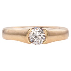 Oro amarillo de 14 quilates 0,56 ct. Anillo de compromiso solitario con medio bisel de diamantes