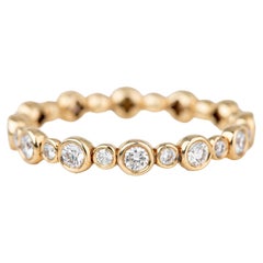 Alianza de oro amarillo de 14 quilates 0,60 ct Daimond