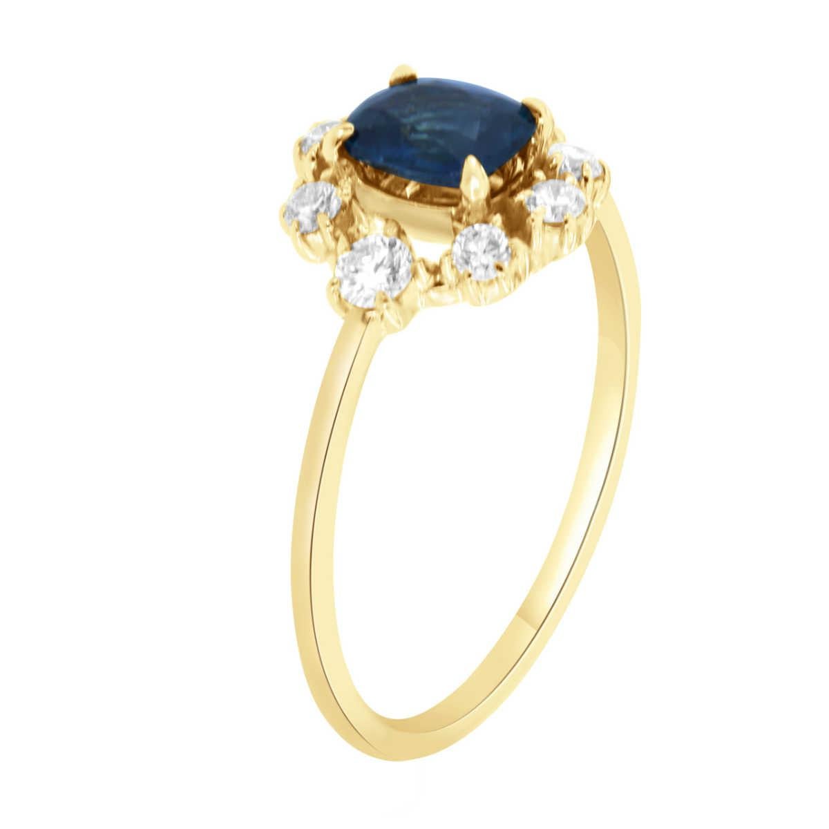 This delicate 14k yellow gold ring features a 0.68 Carat Natural Sri - Lankan blue sapphire Cushion-shaped encircled by a halo of eight (8) brilliant round diamonds in a total of 0.28 carat. The diamonds are G in color and SI1 in clarity.