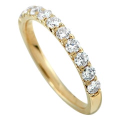 Bague demi-éternité en or jaune 14K sertie d
un diamant de 0,68 ct MF10-111925
