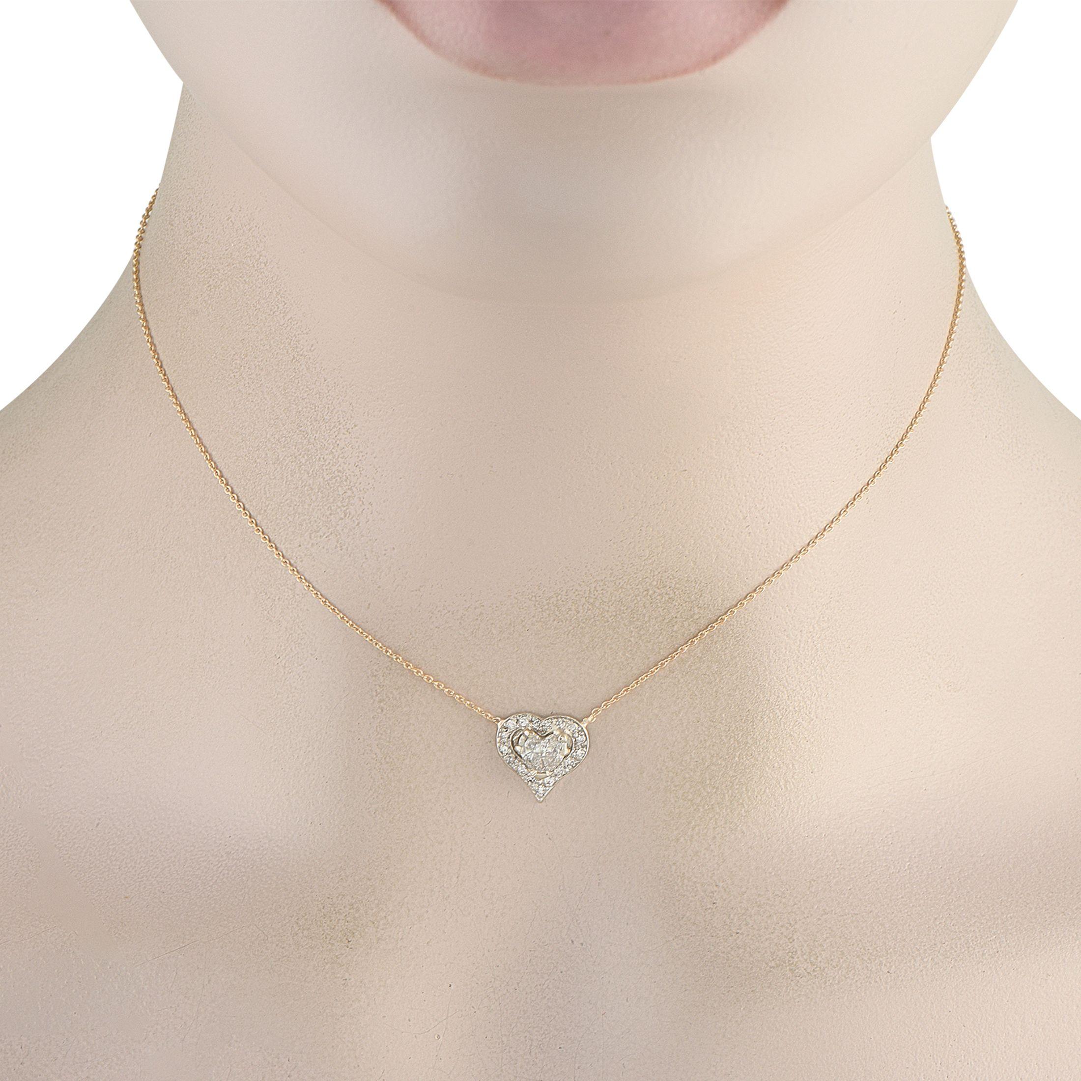 Ce charmant collier en or jaune 14 carats est le moyen idéal d'exprimer votre amour. Sur cette pièce exquise, un pendentif en forme de cœur mesurant 0,48 rond est suspendu à une délicate chaîne de 13,50. Les diamants d'un poids total de 0,71 carat