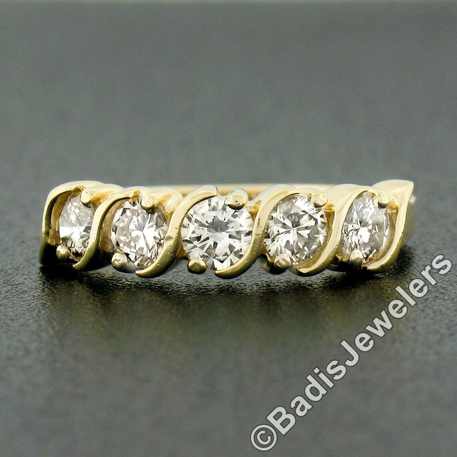 Anello in oro giallo 14K con diamante brillante rotondo da 0,75 ct. e 5 pietre a 