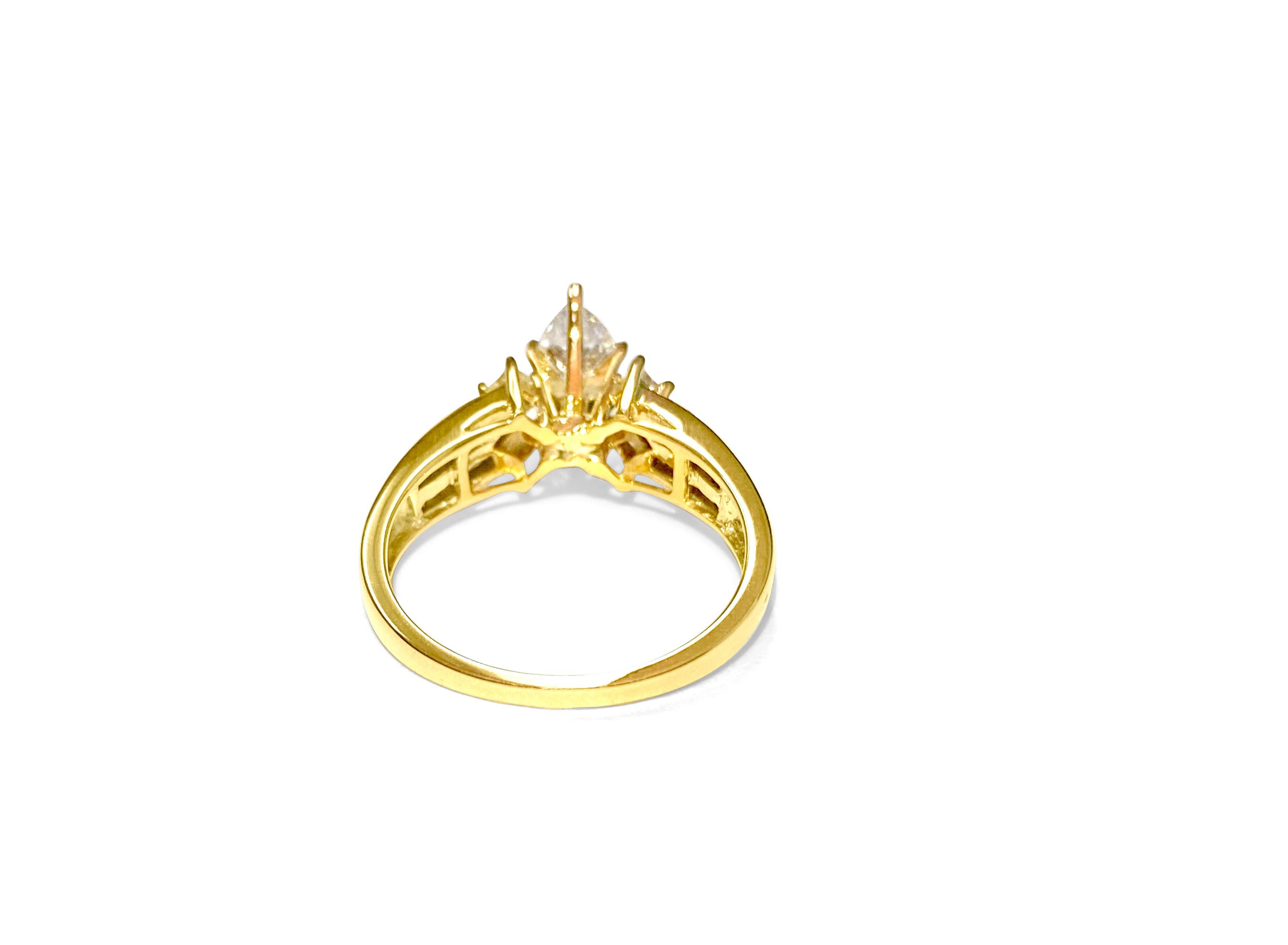 Contemporary 14K Yellow gold. 0.80CT Marquise Cut Diamond Ring For Sale