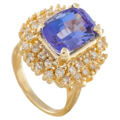 Anello in oro giallo 14K con diamante e tanzanite da 0,92 carati MF17-050526