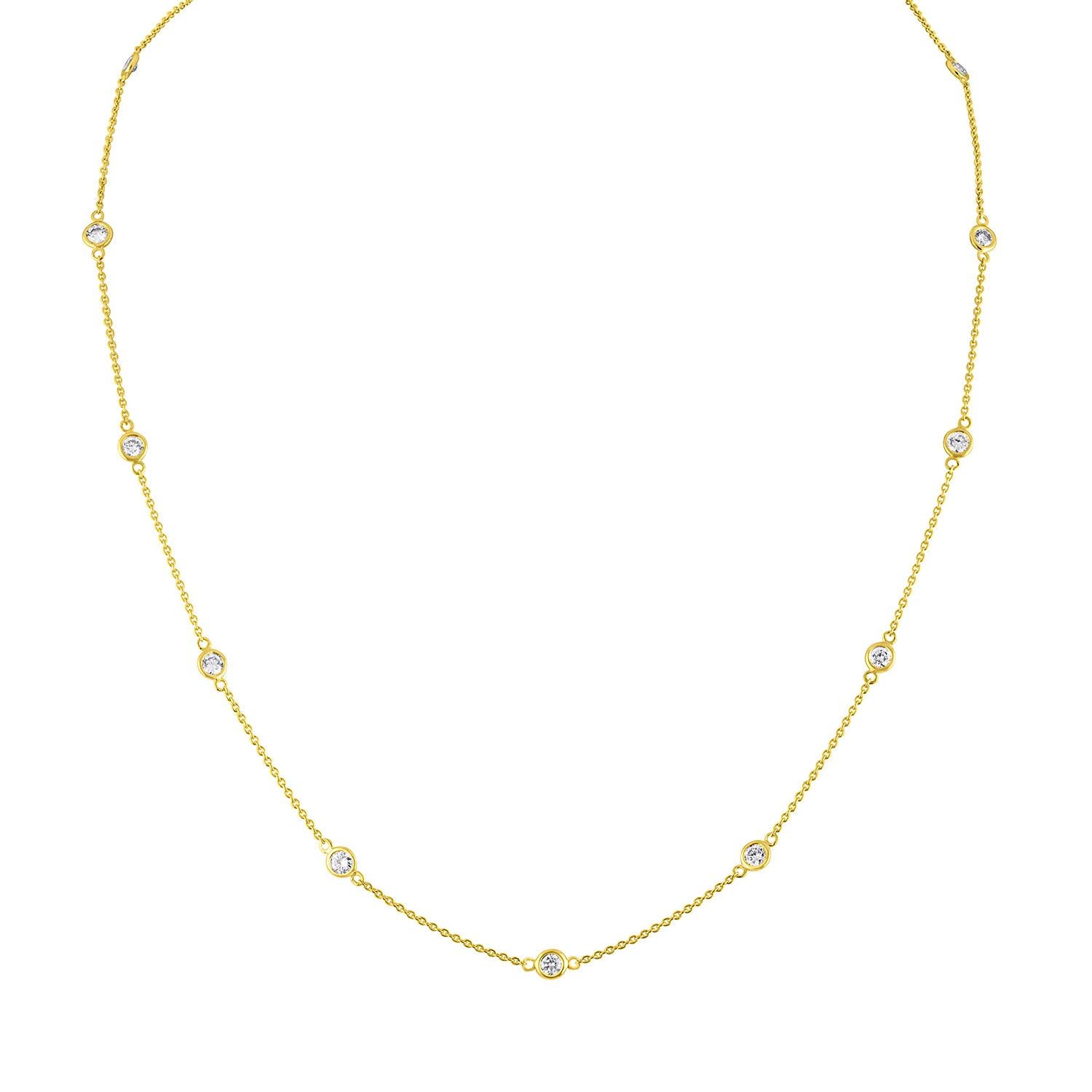 Sparkling 1ct bezel set, round cut natural diamonds are evenly spaced along a rolo chain in this delicate station necklace. A classic and elegant 14k yellow gold design that will elevate any attire. Product features:
Diamond Type: Natural White