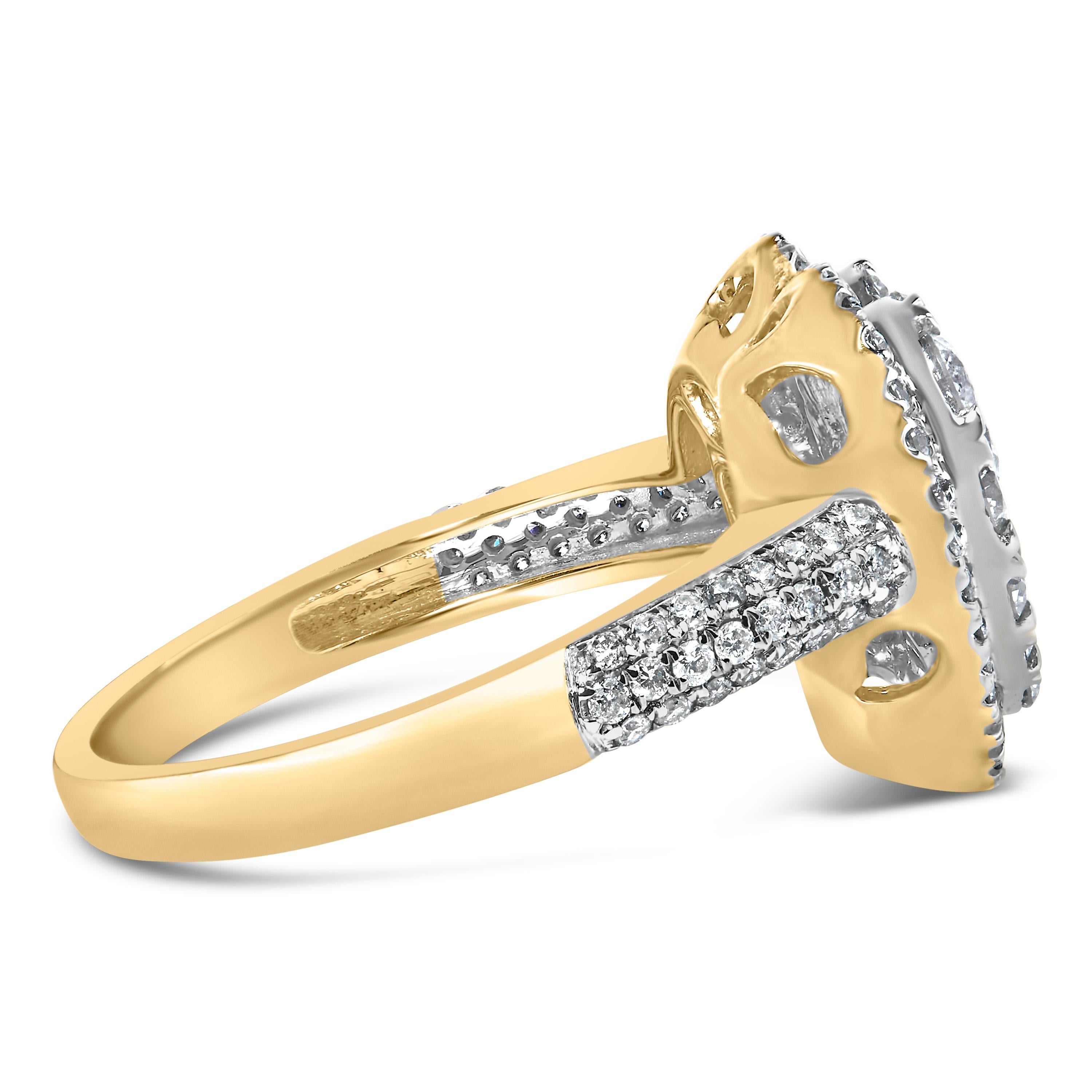 Immerse yourself in the timeless elegance of this exquisite 14K yellow gold ring, where a heart-shaped constellation of natural white diamonds forms a captivating centerpiece. Each gem, resplendent with a clarity graded between SI2 and I1 and a