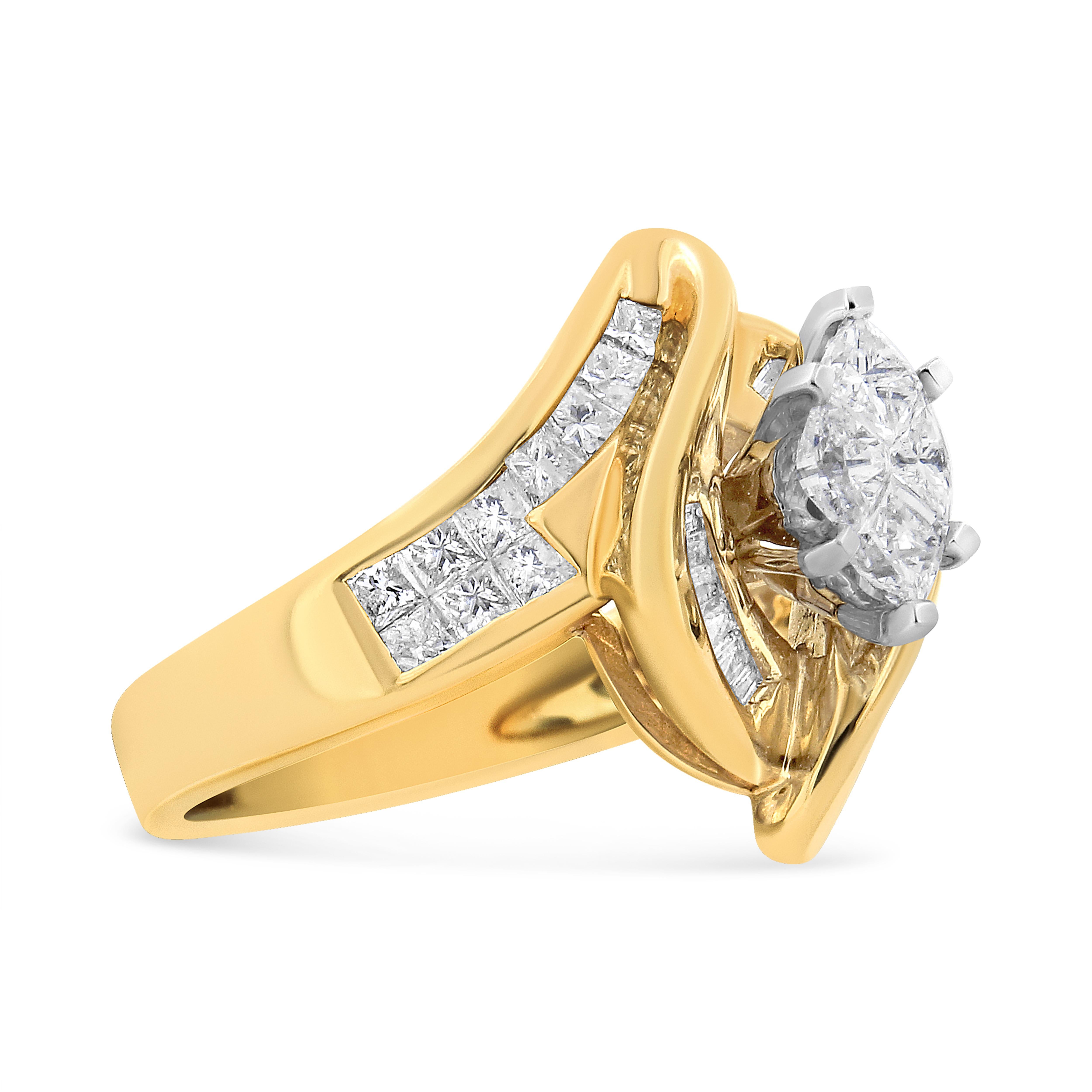 This diamond engagement ring features a central marquise-shaped diamond set within a 14 karat yellow gold band. Baguette and princess cut diamonds along the band add extra sparkle to this elegant design. It has a total diamond weight of 1 1/4