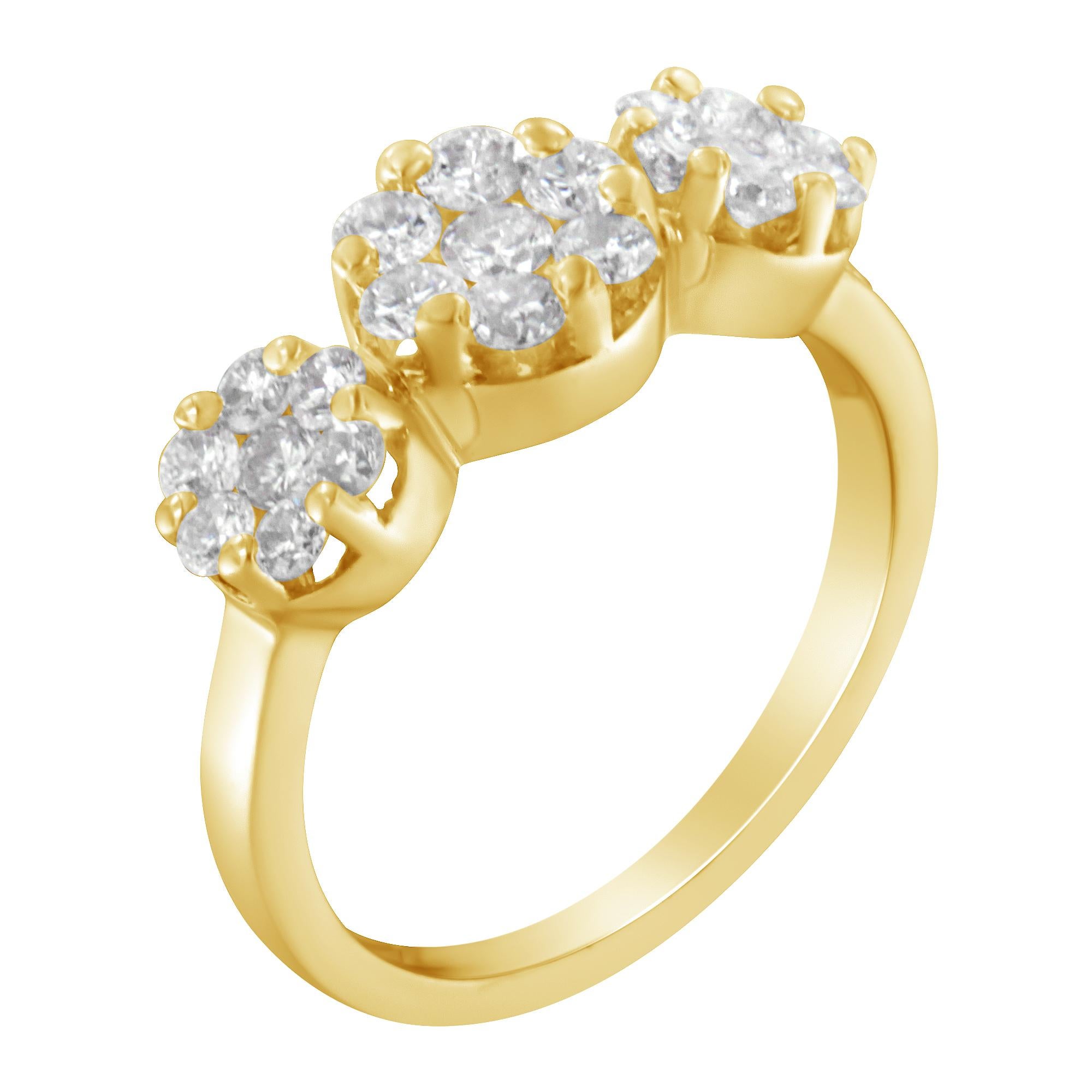 A diamond cluster ring that features three floral clusters of round diamonds. This delicate style is crafted in 14 karat yellow gold and has a total diamond weight of 1 1/4 carats. Product features:
Diamond Type: Natural White Diamond
Diamond Count: