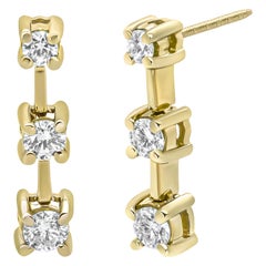Orecchini a goccia lineari graduati con diamante da 1/2 carato in oro giallo 14K