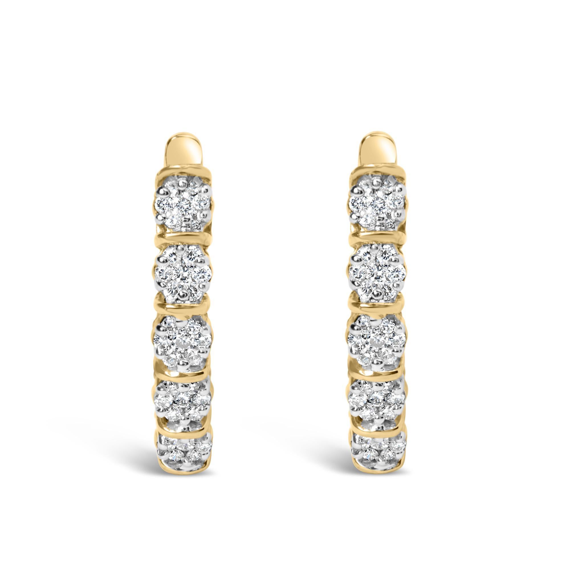 Dotées d'un charme irrésistible et réalisées en or jaune 14 carats, ces boucles d'oreilles exquises sont des trésors qui enchantent et inspirent. Mesurant un élégant 3/4 de pouce en pendentif, le profil mince de 2 mm encercle l'oreille avec une