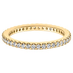 Bague d'éternité en or jaune 14 carats 1/2 carattw, sertie de griffes partagées et de diamants ronds
