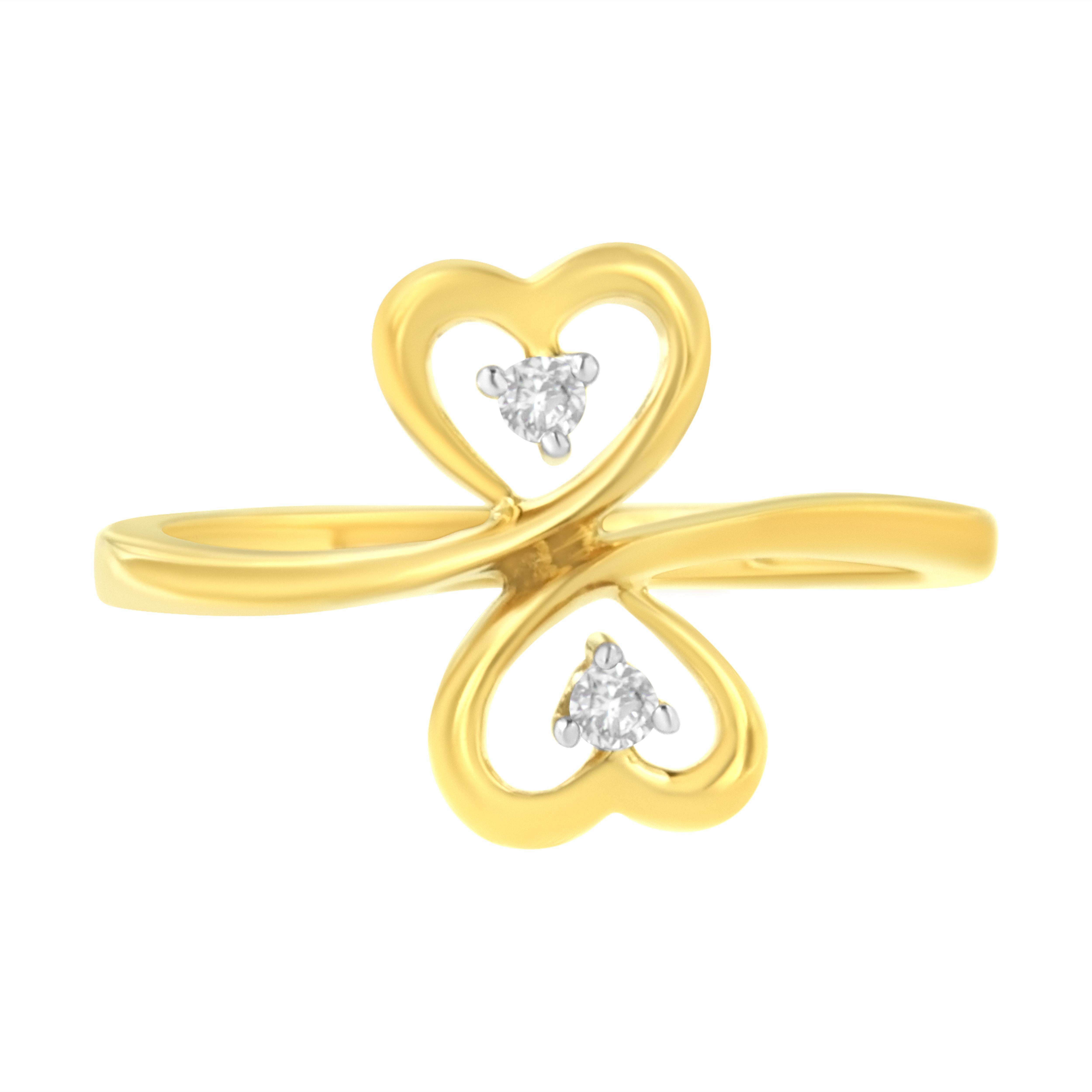 Present this delicate and lovely Dual Heart Diamond Ring as a striking symbol of your undying love. This captivating ring showcases 2 gorgeous round cut accented diamonds, beautifully prong set and rendered to glowing perfection on luminous 14 karat