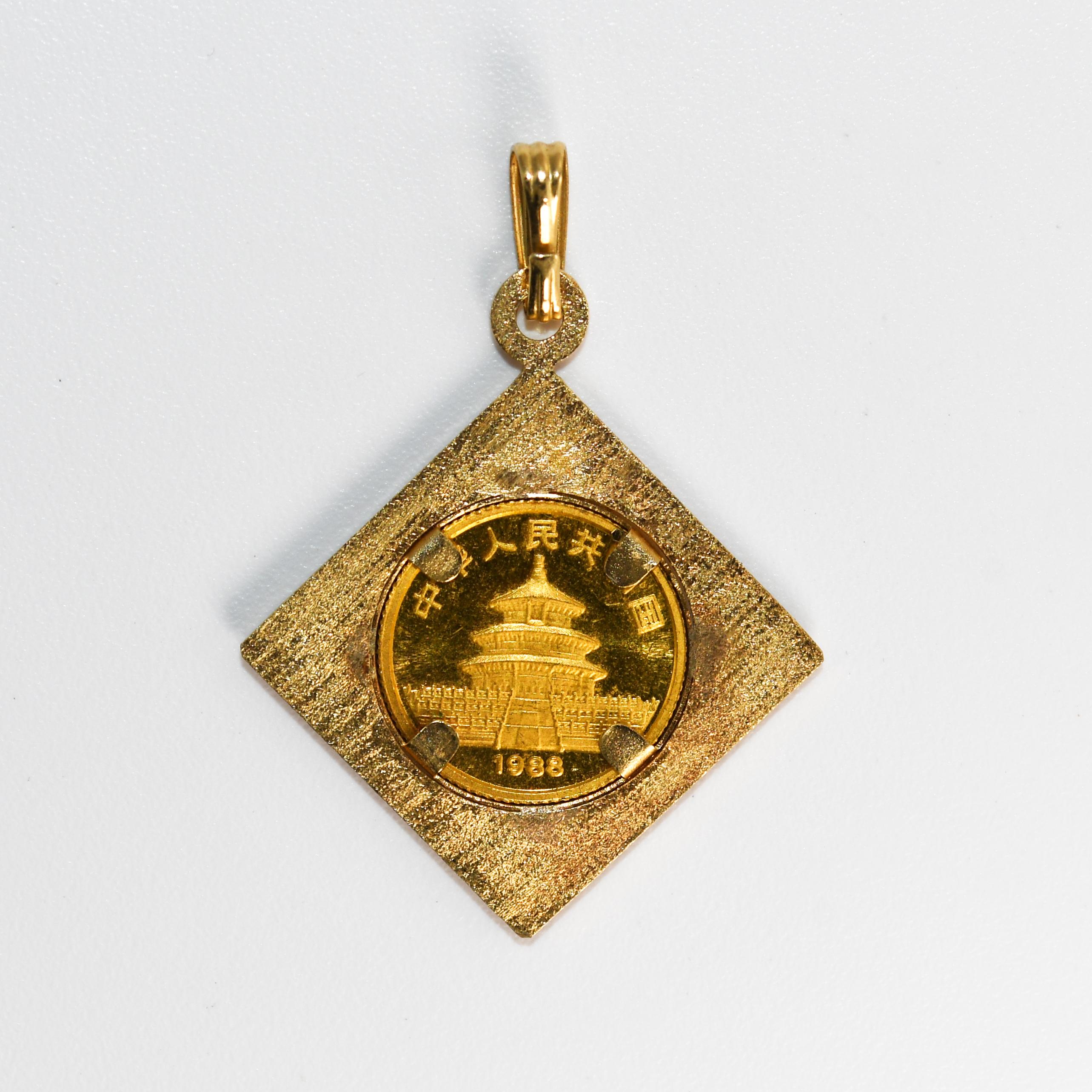 14k yellow gold pendant and 1/20 ounce gold panda coin pendant.
The pendant is stamped 14k and weighs 2.05 grams without the coin.
The 1988 Chinese panda coin is stamped 1/20 oz .999 and weighs 1.55 grams.
The pendant measures 3/4 inches by 3/4