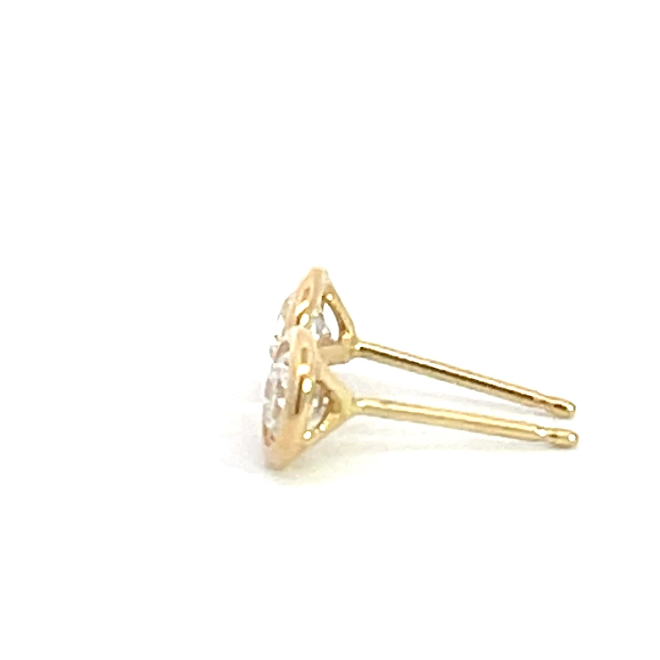 These exquisite 14K yellow gold diamond bezel studs are a true epitome of elegance and sophistication. Crafted with meticulous attention to detail, they exude a timeless charm that will captivate any admirer. Each stud features a stunning 0.50 carat