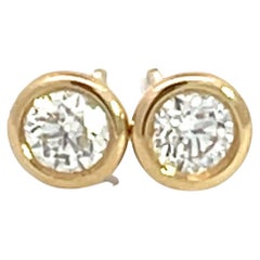 Orecchini con castone in oro giallo 14K con diamante da 1/2ctw