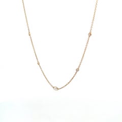 14K Yellow Gold 1/2ctw Diamonds-by-the-Yard Necklace with 0.25ctw Oval Center