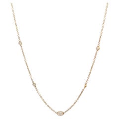 14K Yellow Gold 1/2ctw Diamonds-by-the-Yard Necklace with 0.25ctw Oval Center