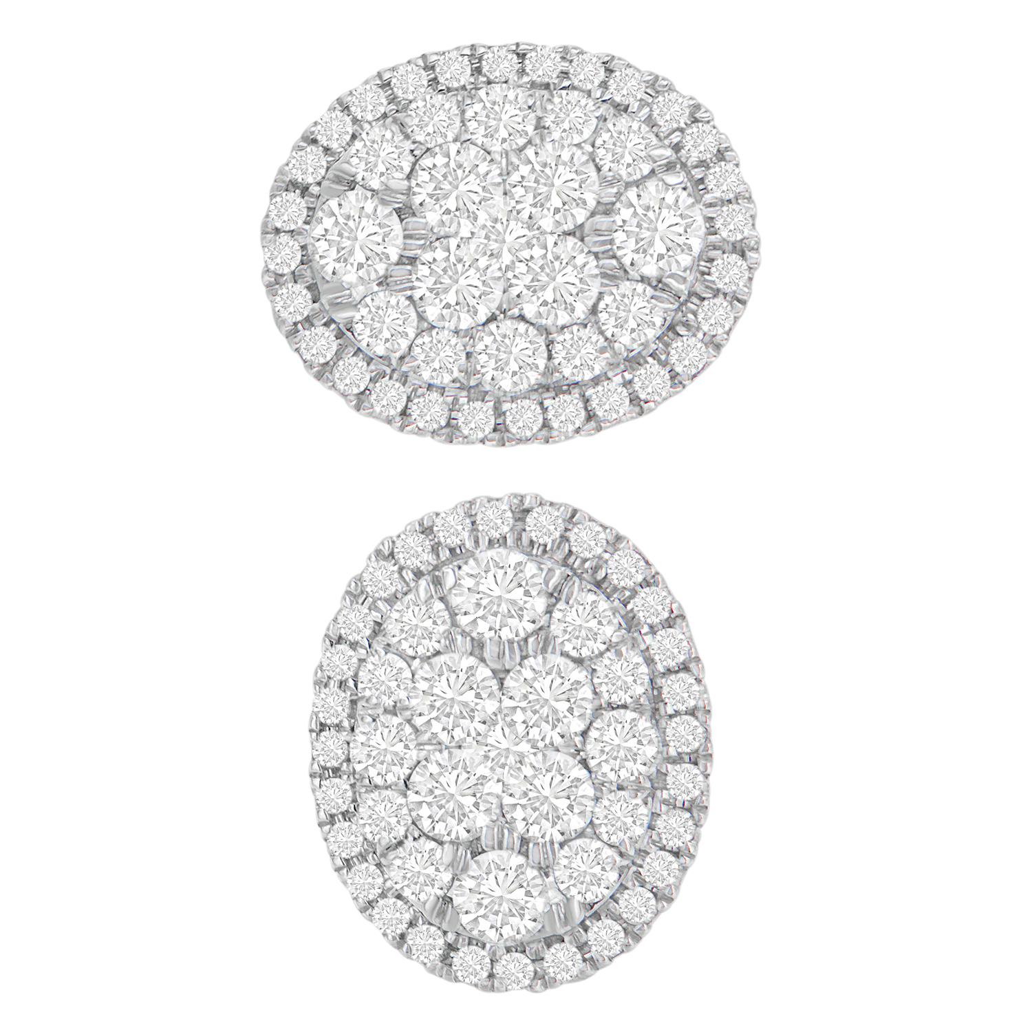 Brilliant to wear with any attire, these diamond earrings makes a stunning addition to your jewelry collection. Designed with elegance, the lovely pair of earrings is fashioned in the oval shape and crafted of 14 karats yellow gold with white
