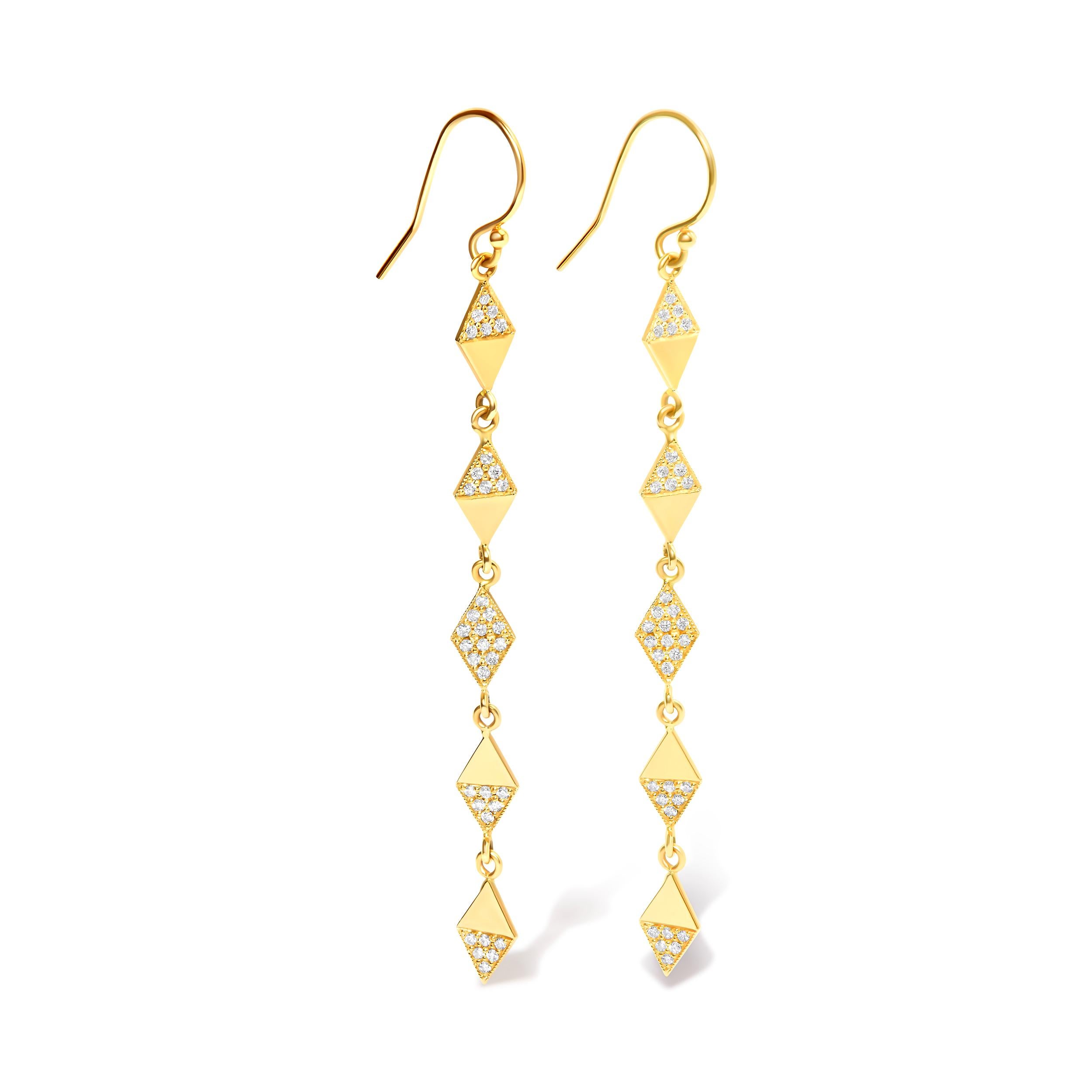 Indulge in the timeless allure of our 14K Yellow Gold Diamond Studded Kite Drop and Dangle Earrings, designed to captivate with every sway. Adorned with a total of 72 natural round diamonds, these earrings boast a dazzling total weight of 1/3 cttw