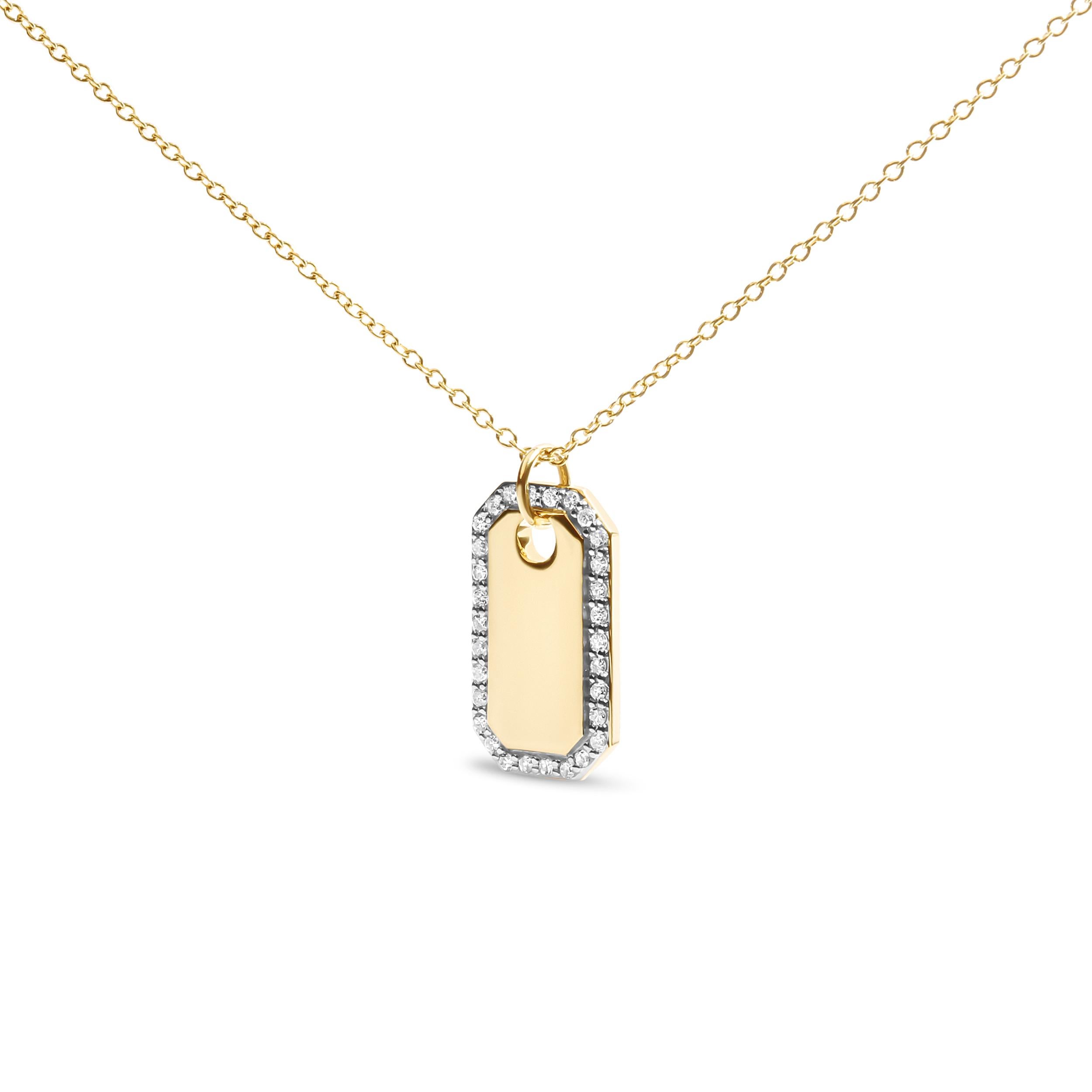 Ti presentiamo un affascinante capolavoro realizzato in oro giallo 14 carati. Questa squisita collana con ciondolo a forma di medaglietta per cani è composta da due pezzi e presenta una placca d'oro al centro, ornata da un'incantevole aureola di 30