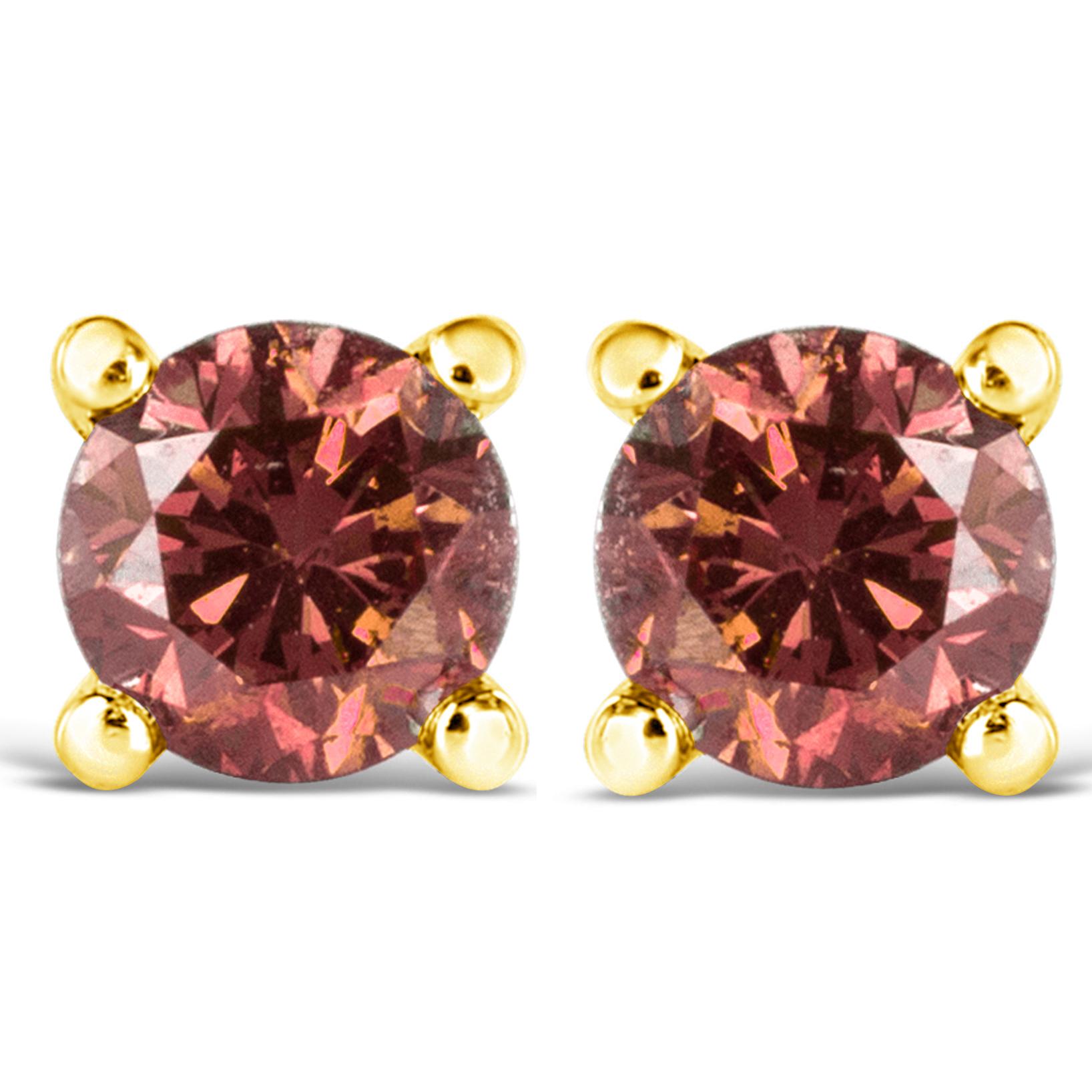 Celebrate any occasion with these classic shimmering solitaire diamond stud earrings. Fashioned in genuine 14k Yellow Gold, each earring showcases a sparkling color treated round cut diamond solitaire. The 2 round, color treated diamonds radiate a