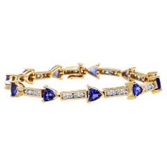 Bracelet à maillons en or jaune 14 carats, diamants 1 5/8 carattw et tanzanite bleue trillion