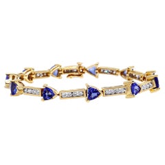 14K Gelbgold 1 5/8 Cttw Diamant und Trillion blauer Tansanit Gliederarmband