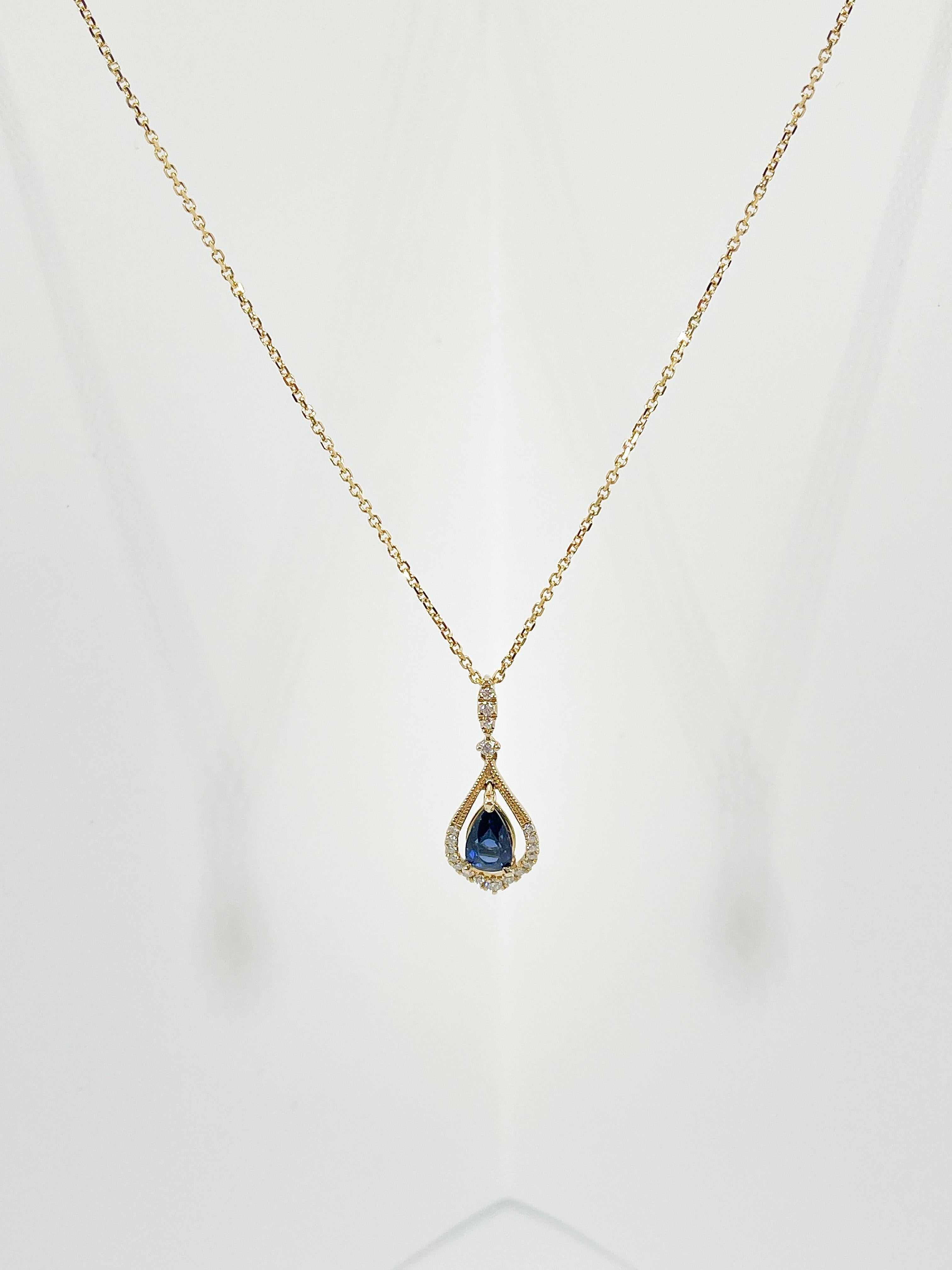 14k yellow gold 1 CT pear sapphire and diamond pendant necklace. The length of the necklace 18 inches, the pendant measures 17 x 9 mm, and the total weight of the necklace is 3.14